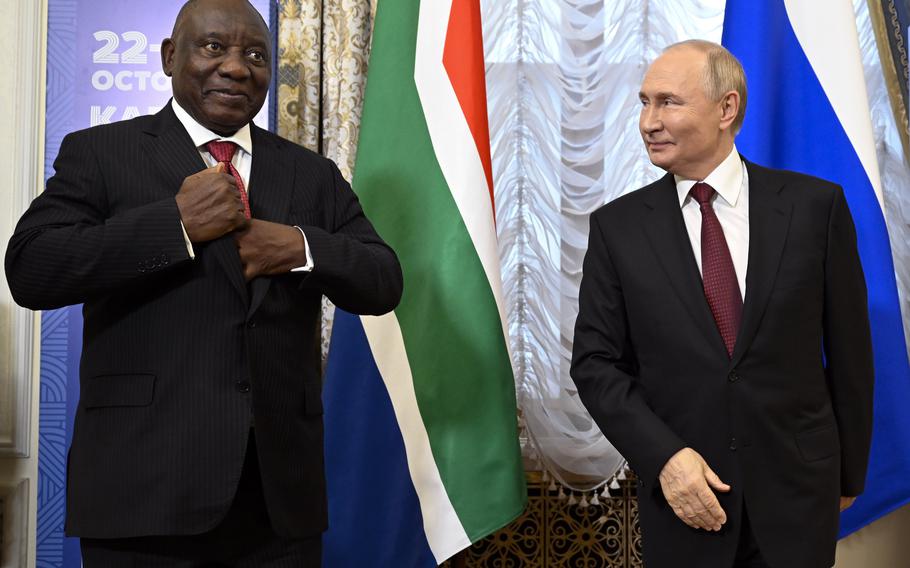 Russian President Vladimir Putin, right, and South African President Cyril Ramaphosa on the sidelines of BRICS Summit at Kazan Kremlin in Kazan, Russia, Tuesday, Oct. 22, 2024. 