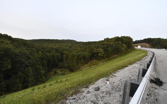 FILE - Trees stand in wooded areas alongside Interstate 75 near Livingston, Ky., Sunday, Sept. 8, 2024, as police search for a suspect in a shooting Saturday along the Interstate. (AP Photo/Timothy D. Easley, File)