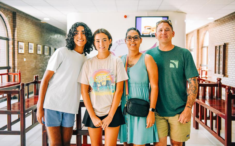 Jeffrey Barnes and Keyla Barnes bring their children, Alycia Romero and Alex Rodriguez, to their first day at the Bahrain School on Aug. 18, 2024. Jeffrey Barnes said he is excited for his children to have a second opportunity overseas, having previously lived in Rota, Spain.