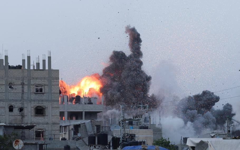 Smoke and flames rise during an Israeli air strike in the central Gaza Strip, June 3, 2024.