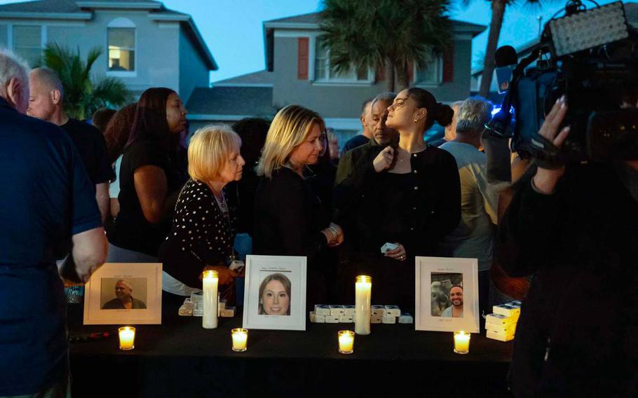 People gathered for a candle vigil in Florida.