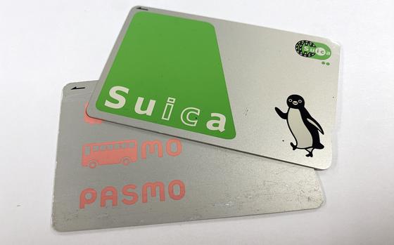 A Suica and Pasmo card are shown.