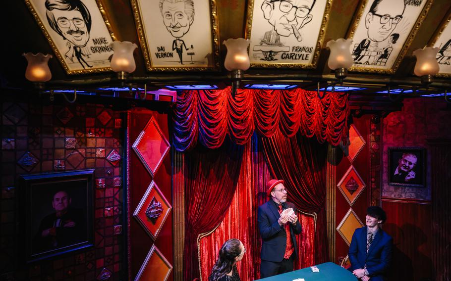 The magician Sharpo performs at the Magic Castle with Trichia Sulham, left, and Matt Sulham, right, on May 30 in Los Angeles.  The club has 38 women in its regular rotation of performers (among 482 magicians over the last three years).  