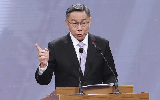 FILE - Taiwan's Taiwan People's Party (TPP) presidential candidate Ko Wen-je speaks at the presidential debates at Taiwan Public Television Service in Taipei, Taiwan, Dec. 30, 2023. (AP Photo/Pei Chen, Pool, File)