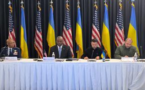 Defense Secretary Lloyd Austin, second from left, and Ukrainian President Volodymyr Zelenskyy speak during a gathering of the Ukraine Defense Contact Group at Ramstein Air Base, Germany, Sept. 6, 2024. To Austin's left is Gen. C.Q. Brown, chairman of the Joint Chiefs of Staff, and  
and Ukrainian Defense Minister Rustem Umerov is to Zelenskyy's right.