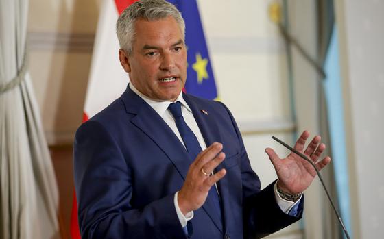 FILE - Austrian Chancellor Karl Nehammer attends a press conference in Vienna on Thursday, Aug. 8, 2024. (AP Photo/Heinz-Peter Bader, File)