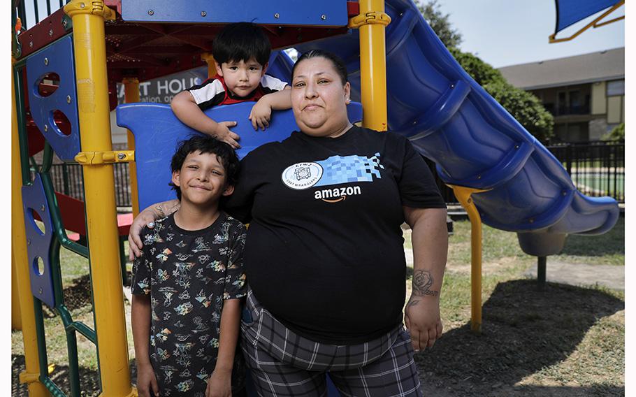 Victoria Halstead with two of her children, Jovani, 8, and Ismael, 3, on June 22 at the apartment complex playground where her 17-year-old son, Mark Halstead used to play as a child. Mark recently settled his manslaughter case in a plea bargain agreement after being in the Dallas County Juvenile Department inside the Henry Wade Juvenile Justice Center. He&apos;s been there since July 2022.