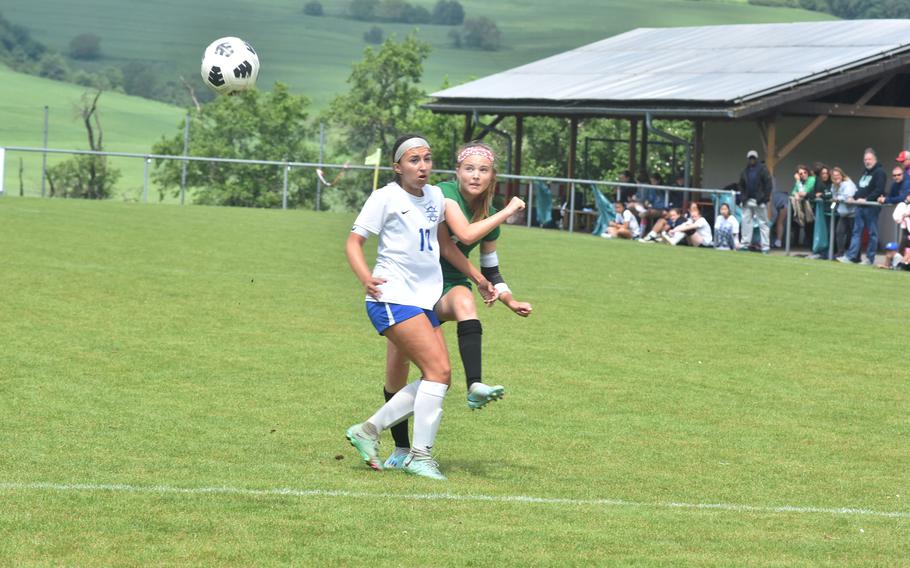 Naples' Hayden Medford gets a shot past Rota's Emma Montoya on Wednesday, May 22, 2024, at the DODEA European Division II girls soccer championships in Reichenbach-Steegen, Germany.