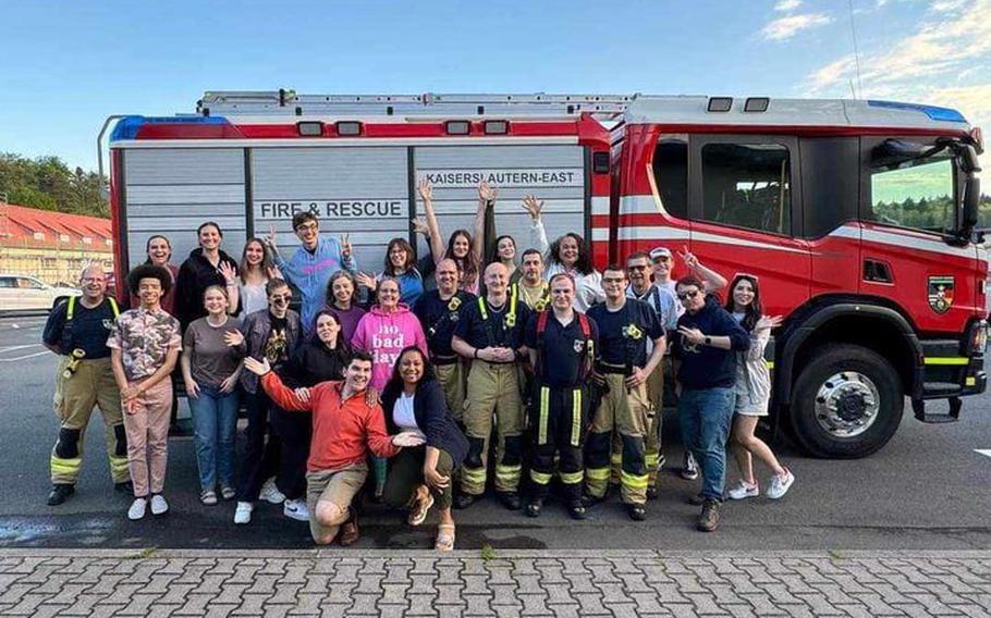Cast and crew of KMC Onstage stand for a photo with firefighters of Fire Station Crew East, after the theater on Kleber Kaserne flooded due to sprinkler malfunction, May 8, 2024. 