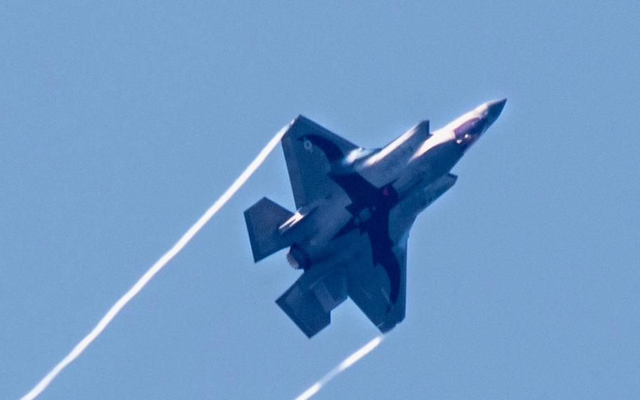 A U.S. Marine Corps F-35B Lightning II aircraft with Marine Fighter Attack Squadron 242, Marine Aircraft Group 12, displays a bat insignia during a flight at Marine Corps Air Station Iwakuni, Japan, June 11, 2024. 