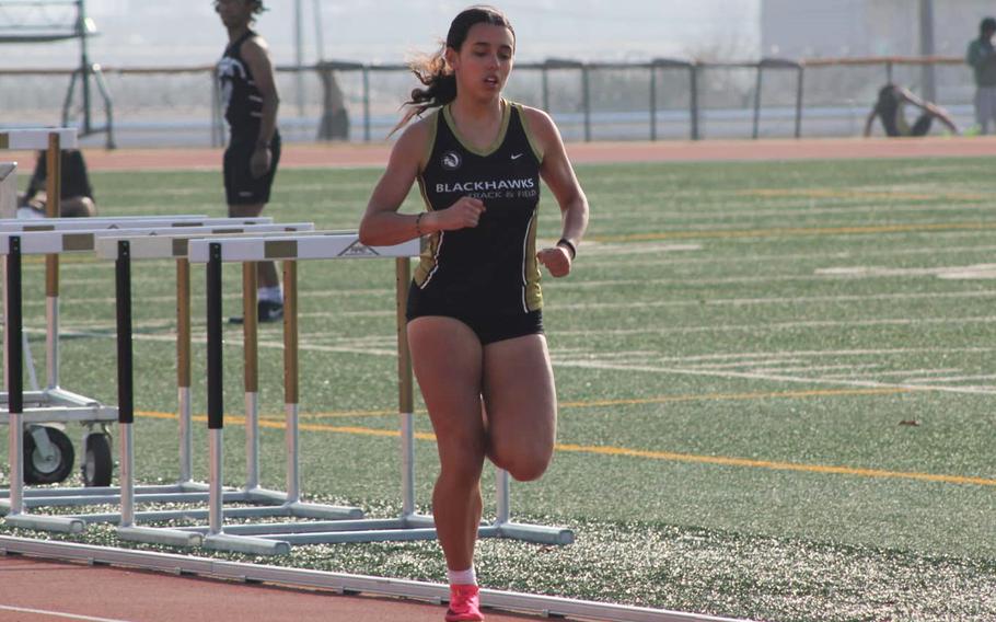 Cassandra Jarzabek runs on the track.