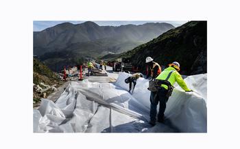 CalTrans employees and contractors prepare a worksite on Highway 1 on April 17, 2024.