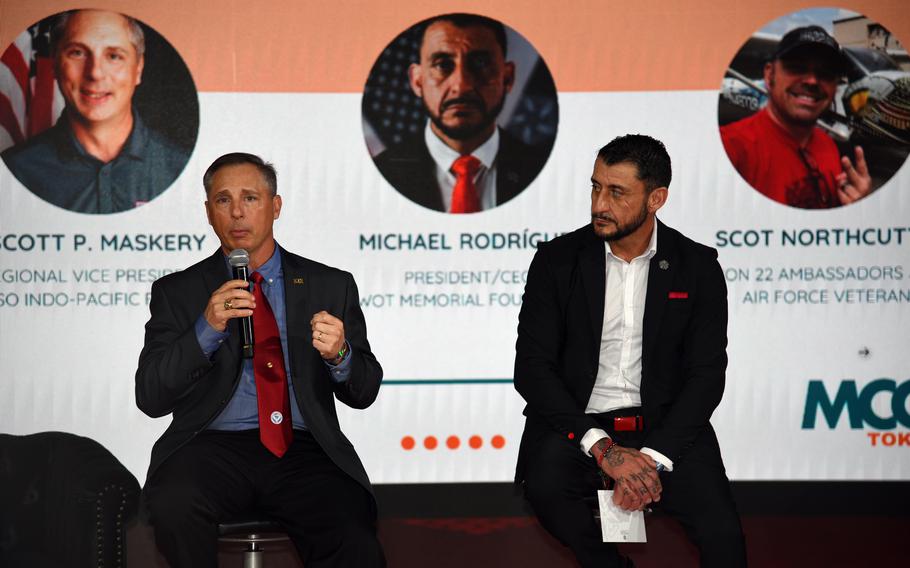 Three men participate in an MCON Asia panel.