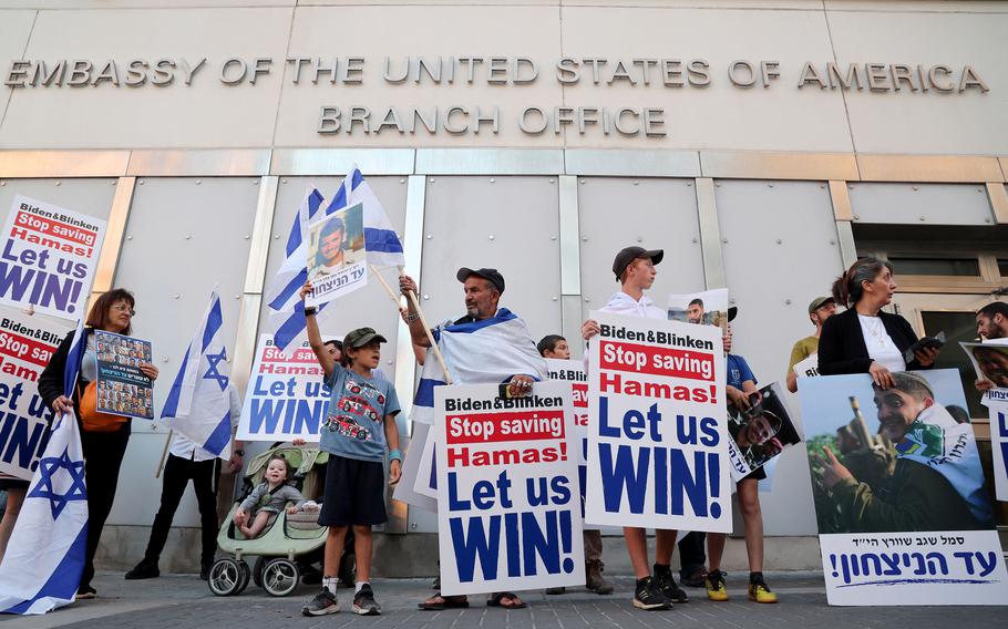 Families of Israeli soldiers who were killed in the ongoing conflict in Gaza between Israel and the Palestinian militant group Hamas, demonstrate outside the U.S. embassy branch in Tel Aviv calling for the war to continue and for the Israeli army to keep on fighting inside Rafah in the south of the besieged Palestinian territory on May 7, 2024. 