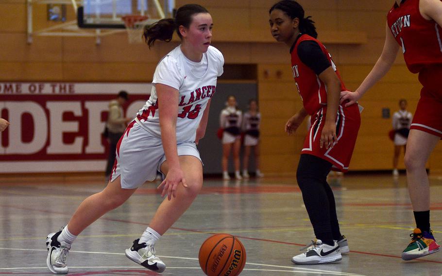 Sydney DuPont drives to the basket.