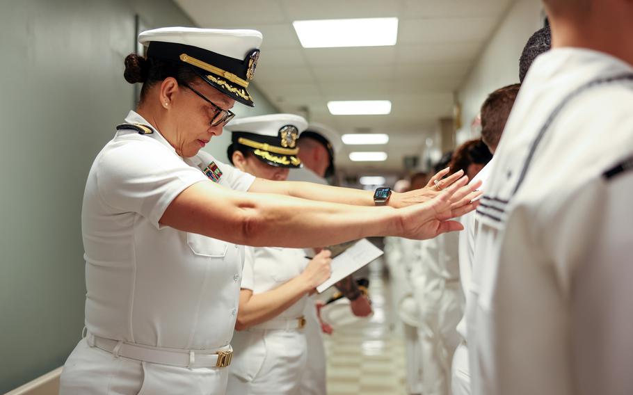 U.S. Navy sailors take part in a uniform inspection at Naval Health Clinic Quantico, Va., April 5, 2024.