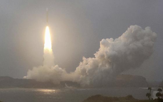 A new flagship H3 rocket carrying a defense ministry communications satellite is launched from Tanegashima Space Center, Kagoshima prefecture, southern Japan Monday, Nov. 4, 2024.  (Kyodo News via AP)