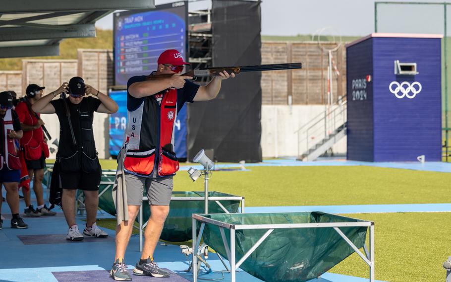 U.S. Army Staff Sgt. Will Hinton takes aim at clay targets during the men’s trap qualification round at the Chateauroux Shooting Centre in Chateauroux, France, on Tuesday, July 30, 2024.