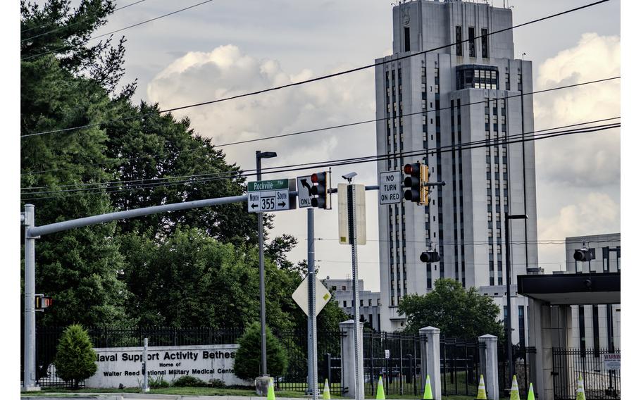 The Walter Reed National Military Medical Center is seen on June 27, 2023, from outside the gated campus in Bethesda, Md. According to reports on Tuesday, the Naval Criminal Investigative Service is looking for potential victims to come forward, after federal authorities arrested a Navy psychologist who has worked at multiple installations including the Walter Reed center.