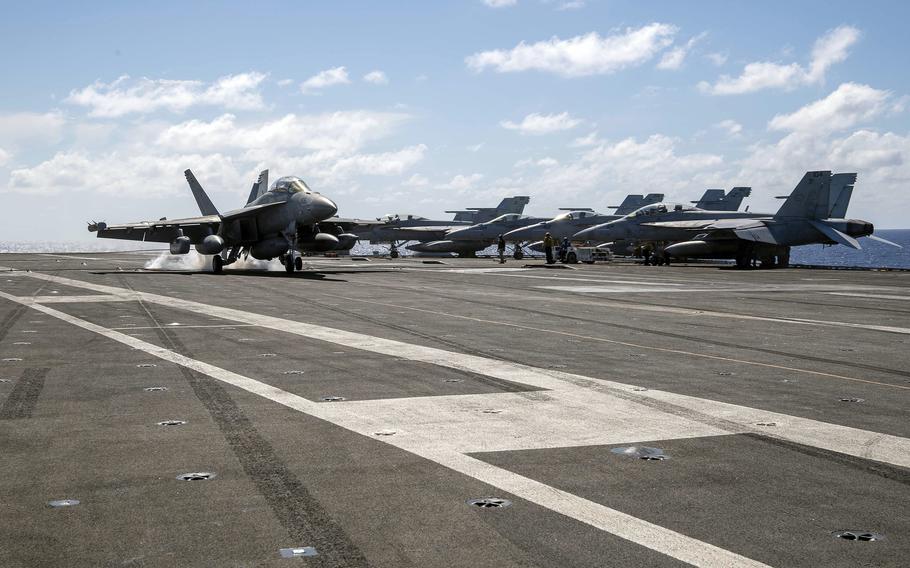 An EA-18G Growler lands on the USS Ronald Reagan during a Valiant Shield drill in the Philippine Sea, June 7, 2024.