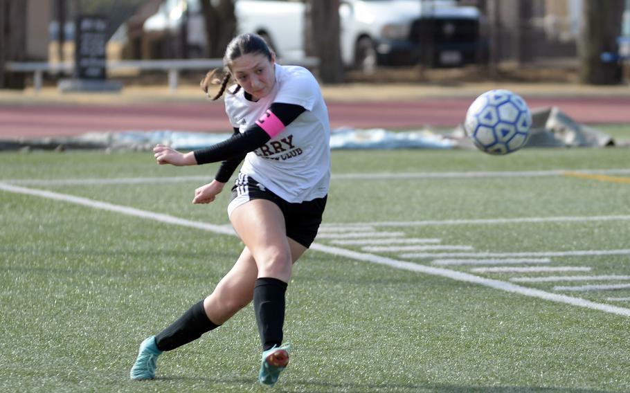 McKenzie Steele launches the ball.