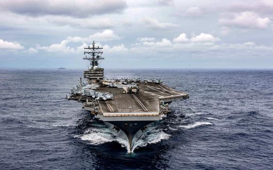 The aircraft carrier USS Ronald Reagan sails in the Philippine Sea, Oct ...