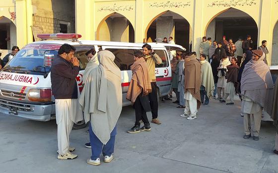 Relatives gather to collect the body of a person who was killed when gunmen fired on vehicles carrying Shiite Muslims Thursday, at a hospital in Parachinar, main town of Kurram district of Pakistan's northwestern Khyber Pakhtunkhwa province, Friday, Nov. 22, 2024. (AP Photo/Hussain Ali)