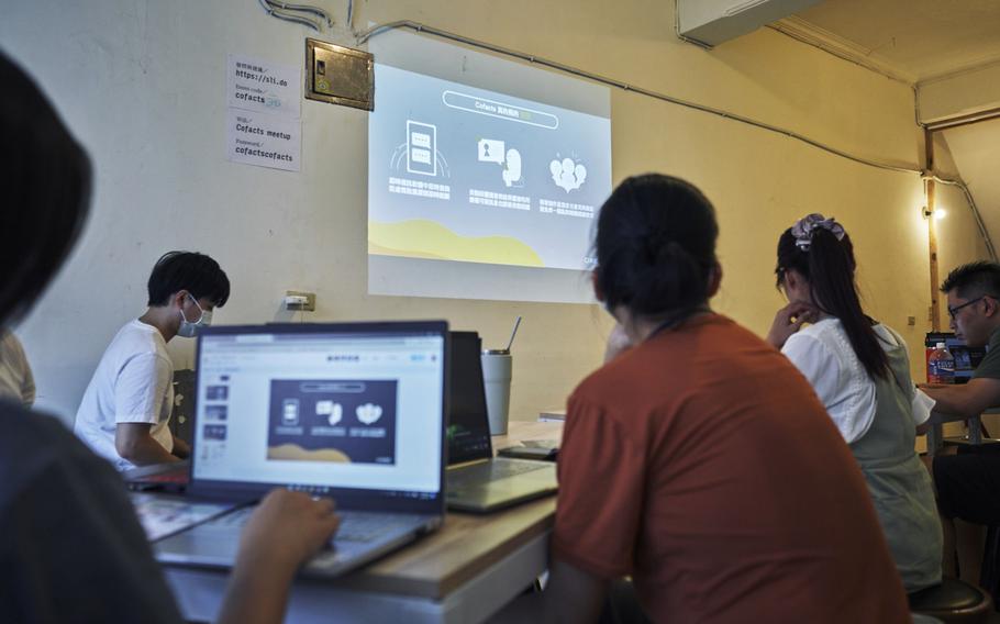 Participants in a Cofacts workshop learn how to fact-check sources and news in Keelung, Taiwan, on July 9. 