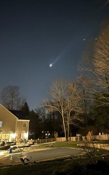 A photo from a witness shows lights in the sky believed to be drones.