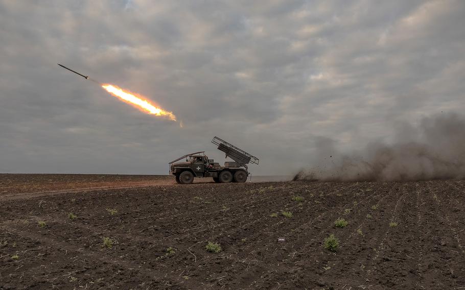 Ukrainian servicemen of the 92nd Assault Brigade fire BM-21 ‘Grad’ multiple rocket launcher toward Russian positions, in the Kharkiv region, on May 15, 2024.