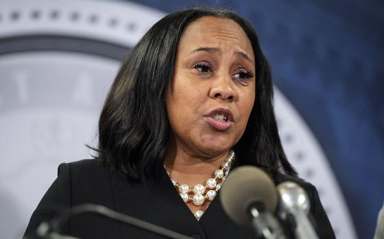 FILE - Fulton County District Attorney Fani Willis speaks during a news conference, Aug. 14, 2023, in Atlanta. Voters in Georgia, Kentucky, Oregon, and Idaho will hold state primaries to choose nominees for U.S. House and other contests. Willis, who is leading the prosecution of Trump in a 2020 election interference case, faces challenger Christian Wise Smith in the Democratic primary on Tuesday, May 21, 2024. (AP Photo/John Bazemore, File)