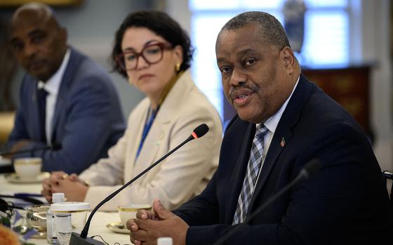 Haitian Prime Minister Garry Conille, right, speaks as Haitian Foreign Minister Dominique Dupuy, center, looks on during a meeting with U.S. Secretary of State Antony Blinken at the State Department in Washington, D.C., on July 2, 2024. (Drew Angerer/AFP/Getty Images/TNS)