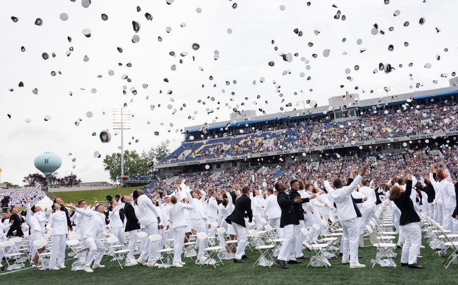 Newly commissioned U.S. Navy ensigns and Marine Corps second lieutenants of the U.S. Naval Academy’s Class of 2022 toss their covers at the conclusion of the graduation and commissioning ceremony.