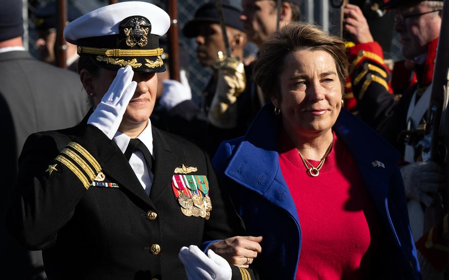 Commanding officer of the USS Nantucket, Cmdr. Kari Yakubisin, is seen on the left escorting Massachusetts Gov. Maura Healey for the ship’s commissioning ceremony, Nov. 16, 2024.