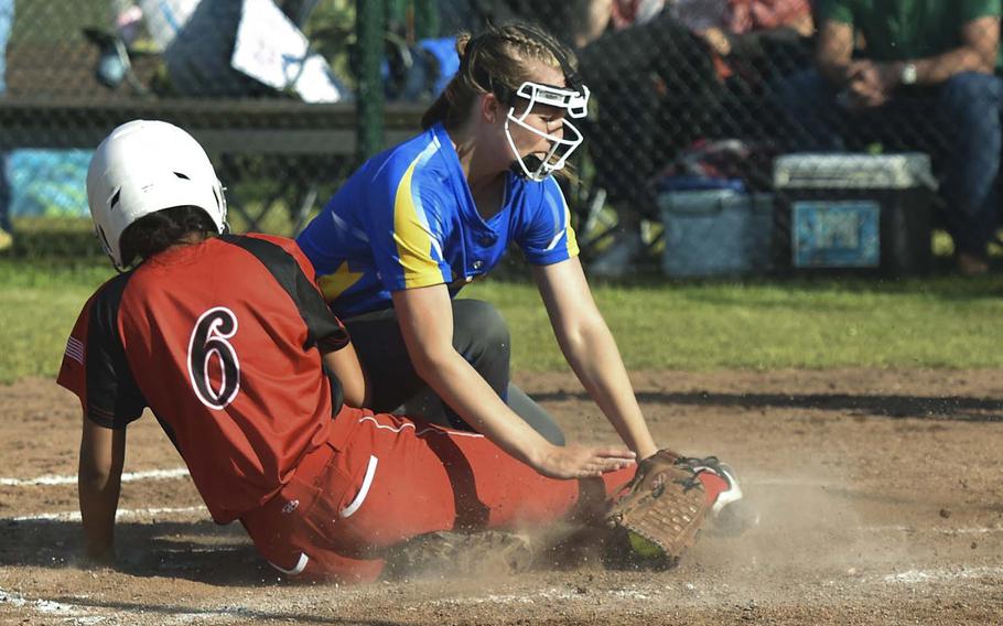 Wiesbaden pitcher Valerie Fisher attempts at tag at home against Kaiserslautern freshman Kaleah Connor during the European championships on May 22, 2024, in Kaiserslautern, Germany.  Wiesbaden won the game 10-5.