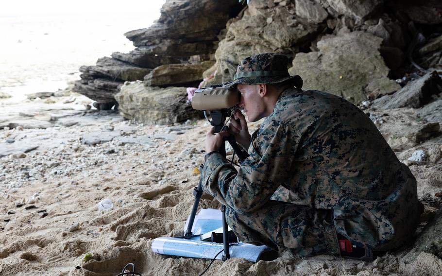 Cpl. Hunter Way, a fire support Marine with Marine Rotational Force -- Southeast Asia, watches for vessels during an exercise in Sorsogon, Philippines, Oct. 9, 2023. 