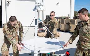 Members of the 114th Electromagnetic Warfare Squadron, Florida Air National Guard, operate a satellite at Cape Canaveral Space Force Station, Florida, Jan. 8, 2023. The unit's federal mission is to deliver offensive counterspace and space situational awareness to rapidly achieve flexible and versatile effects in support of global and theater campaigns. They also provide mission-ready citizen-Airmen and equipment to Combatant Commanders in support of operations worldwide. (U.S. Air National Guard photo by Senior Airman Jacob Hancock)