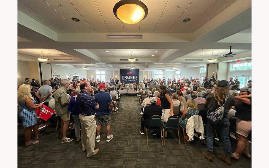 A crowd gathers Monday afternoon, July 17, 2023, in anticipation of a visit by Florida Gov. Ron DeSantis to Tega Cay, S.C.