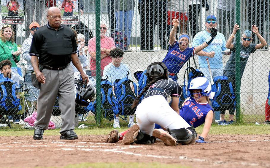 Kaiserslautern catcher Alessia Garcia tags Ramstein's Isabella Chambers at home plate during the Division I DODEA European softball championship game on May 24, 2024, at Kaiserslautern High School in Kaiserslautern, Germany.