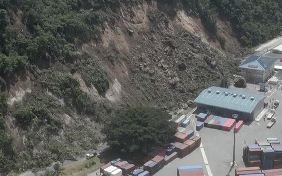 This image made from a video shows a landslide near an international shipping terminal in Port Vila, Vanuatu following a powerful earthquake Tuesday, Dec. 17, 2024. (Dan McGarry via AP)