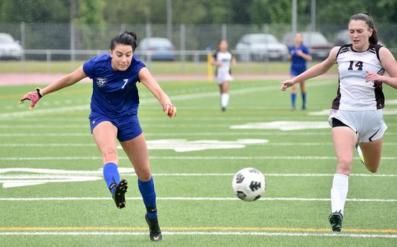 Wiesbaden winger Sophia St. Laurent shoots while Vilesck defender Sophie Feforisin chases during a pool-play match May 21, 2024, at Ramstein High School on Ramstein Air Base, Germany.