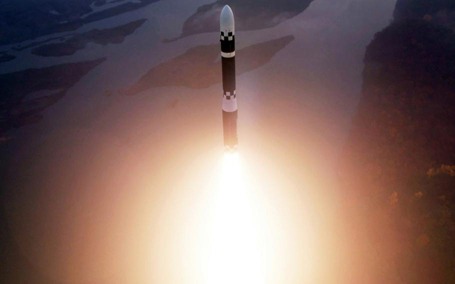 An intercontinental ballistic missile rises into the sky.