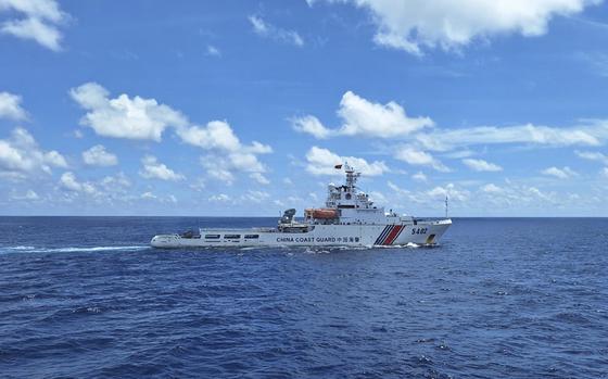 In this photo released by Indonesian Maritime Security Agency (BAKAMLA) a Chinese Coast Guard ship with hull number 5402 sails in North Natuna waters in the disputed area of the South China Sea, Indonesia, Friday, Oct. 25, 2024. (BAKAMLA via AP)