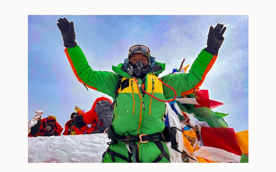Kami Rita Sherpa, 53, a Nepali Mountaineer is pictured on the summit of Mount Everest during his 28th summit in Everest, May 23, 2023.