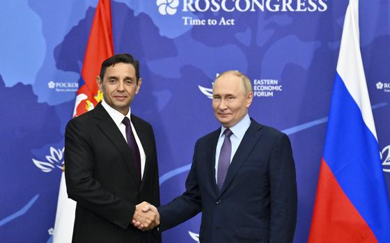 Russian President Vladimir Putin, right, and Serbian Deputy Prime Minister Aleksandar Vulin pose for a photo on the sidelines of the Eastern Economic Forum in Vladivostok, Russia, Wednesday, Sept. 4, 2024. (Kristina Kormilitsyna, Sputnik, Kremlin Pool Photo via AP)