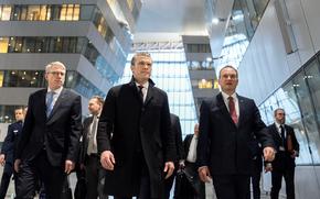 Defense Secretary Pete Hegseth, center, arrives at NATO headquarters in Brussels for the 26th Ukraine Defense Contact Group meeting in Brussels, Feb. 12, 2025.