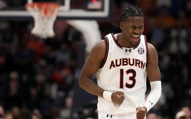 An Auburn player roars in excitement.