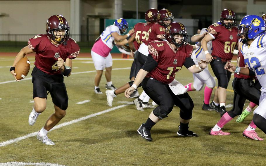 Jordan Burford runs with the ball.