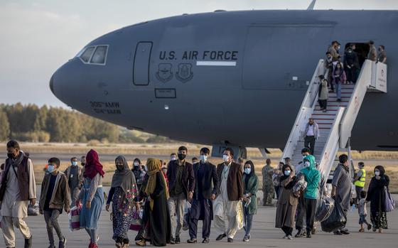 Afghan evacuees disembark from US Air Force plane at Rota Naval Base on Aug. 31, 2021, in Rota, Spain. (Pablo Blazquez Dominguez/Getty Images/TNS)