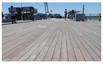 The new teak deck on the USS Alabama at Battleship Memorial Park on Thursday, June 20, 2024, in Mobile, Ala. The new deck is made from the same wood as the original and cost around $8.6 million.